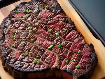3 inch thick ribeye steak on BBQ