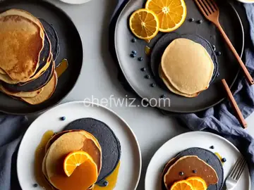 Blue Corn Pancakes with Orange Honey Butter and Cinnamon Maple Syrup