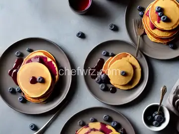 Cornmeal Pancakes with Blueberry Syrup