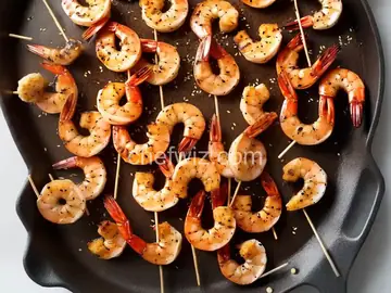 Grilled Shrimp Skewers with Soy Sauce, Fresh Ginger and Toasted Sesame Seeds