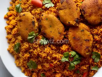 Nigerian Jollof Rice with Chicken and Fried Plantains