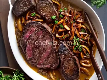 Pan-Roasted Ribeye with Caramelized Onions and White Truffle Butter