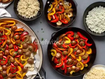 Roasted Sausages, Peppers, and Onions and Cheesy Bread with Black Pepper