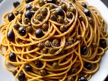 Spaghetti Puttanesca (Spaghetti With Capers, Olives, and Anchovies) Recipe