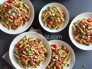 Spanish Pasta Salad With Chorizo, Piquillo Peppers, and Pickled Onion Recipe