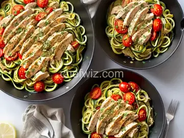 Zucchini Noodles with Chicken and Tomatoes in a Lemon Garlic Sauce