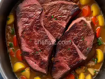 hubby's tri tip. ( Dutch oven style)