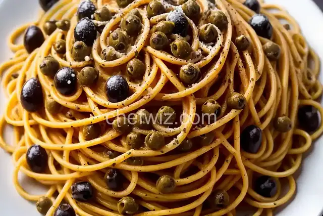 Spaghetti Puttanesca (Spaghetti With Capers, Olives, and Anchovies) Recipe