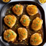 Baked Chicken Thighs Coated With Corn Flake Crumbs compressed image1
