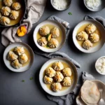 Fresh Peach Dumplings Served with Hard Sauce compressed image1