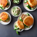 Sous Vide Pork Belly Buns With Pork Braise Mayonnaise and Quick Pickled Cucumbers Recipe compressed image1